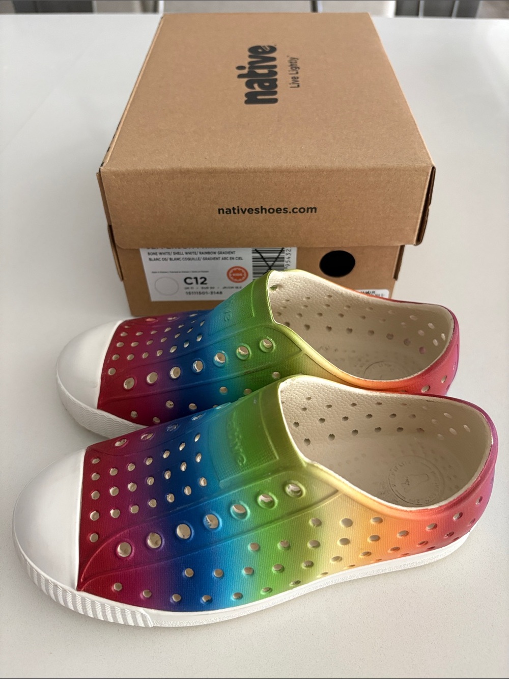 Native kids Slip-On Shoes in Rainbow Gradient C12